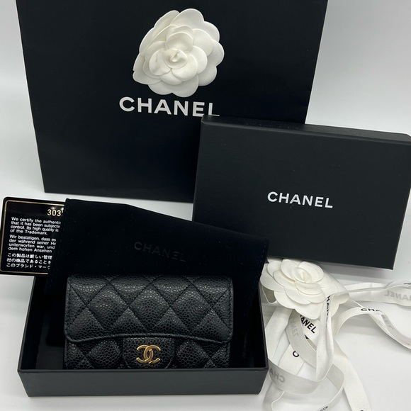 CHANEL Handbags - Authentic Chanel classic Black caviar card holder in GHW